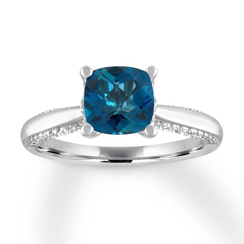 Blue Topaz Engagement Ring 1/4 ct tw Diamonds White Gold Plated